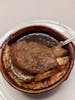 Baked French Onion Soup showing underside of the cheesy bread