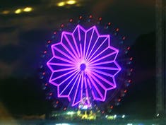 Ferris Wheel seen from our swhip lit up at night