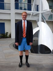 Who doesn't love a cute businessman in Bermuda shorts and a suit?