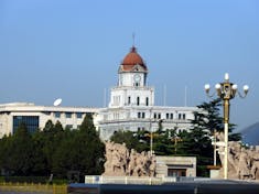 Xingang (Beijing), China - Bank of China with Memorial in foreground