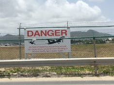 Sign at Maho Beach next to STX, St. Maarten