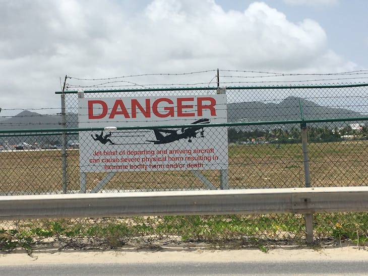 Philipsburg, St. Maarten - Sign at Maho Beach next to STX, St. Maarten