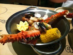 Crab legs and corn in the Crab Shack on Royal Princess