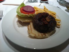 A burger in the main dining room on Royal Princess