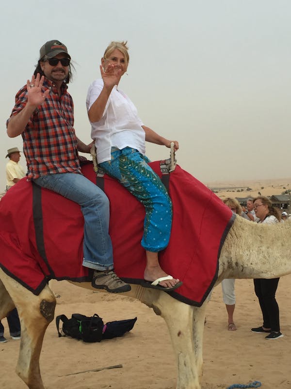 After 4x4 w/15 vehicles, we did camel ride before dinner at camp in Dubai desert - Amsterdam
